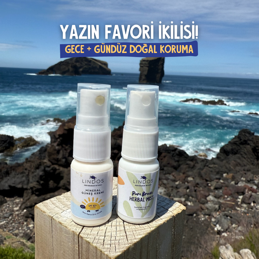 Deniz kıyısında Lindos mineral güneş kremi SPF 50+ ve bitkisel mist mini ikilisi, yazın favori doğal koruması